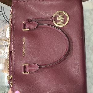 Wine colored Michael Kors satchel